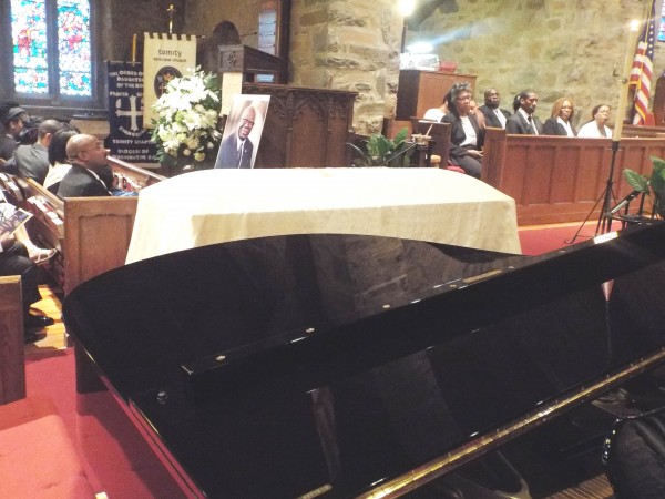 Casket containing the remains of the Late Ambassador Alexander N Wallace