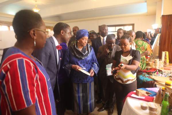 President Sirleaf tours the trade fair at the Monrovia City Hall during the MSME Conference 2015