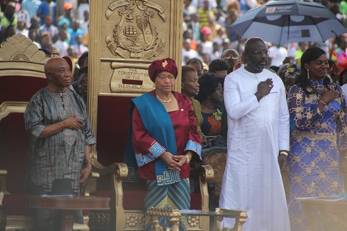 L-R Outgoing VP President Sirleaf President Weah and First Lady Clar Weah