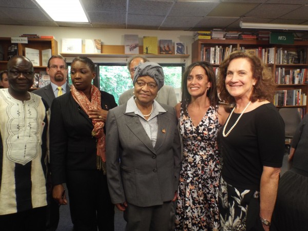 President Sirleaf flanked by author Riva Levinson (immediate right) and Ambassador Sulunteh (extreme left)