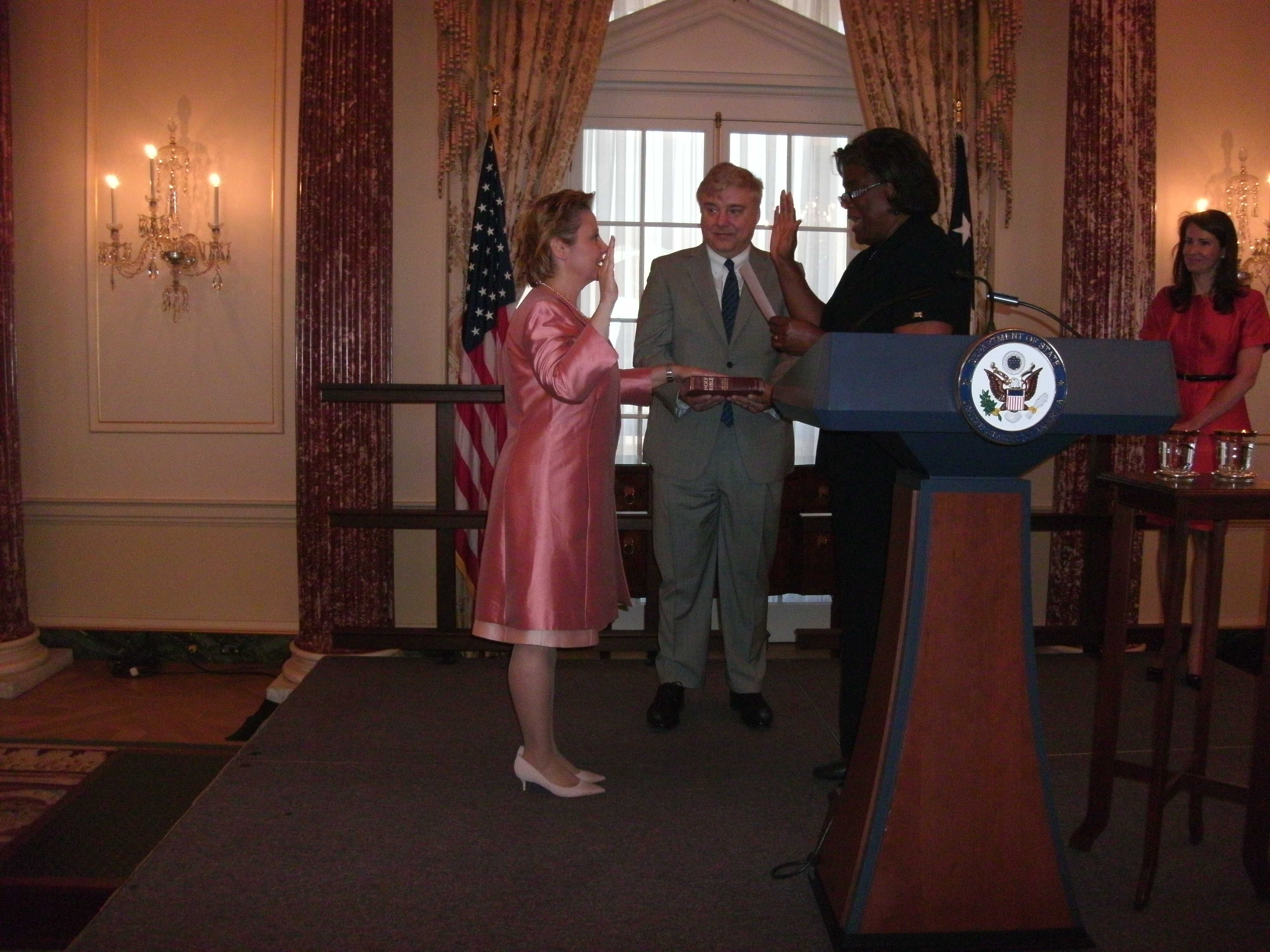 Ambassador Christine Ann Elder is being sworn in by Assistant Secretary for African Affairs. Lynda Thomas Greenfield