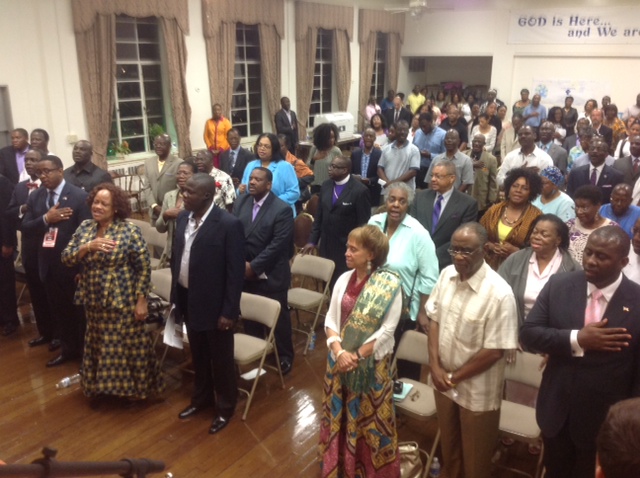 Everyone stand at attention as the Liberian National Anthem is played at the close of the Town Hall Meeting in the Washington DC area, USA